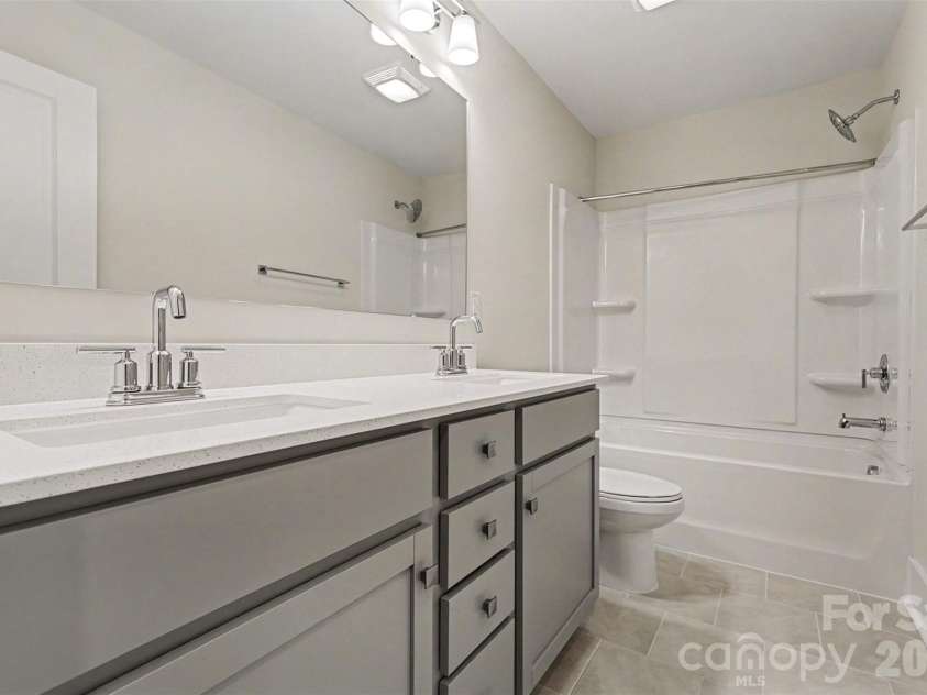 4768 Americana Avenue, Charlotte, NC 28215.  MLS# CAR4342120, YatesRealty ID 2457. Second Floor Hall Bathroom