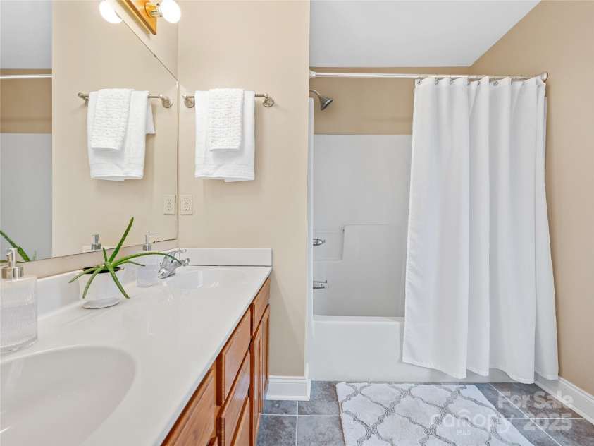 7 Mill Stone Drive, Asheville, NC 28803.  MLS# CAR4267666, YatesRealty ID 24570. Primary bathroom