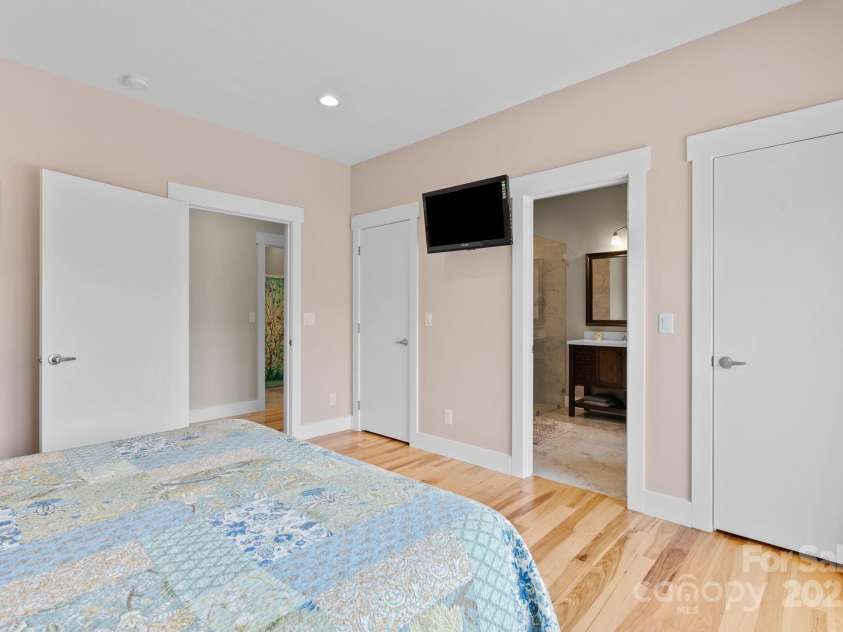 41 Bell Sprinkle Road, Weaverville, NC 28787.  MLS# CAR4268060, YatesRealty ID 24576. Guest bedroom with private full bathroom