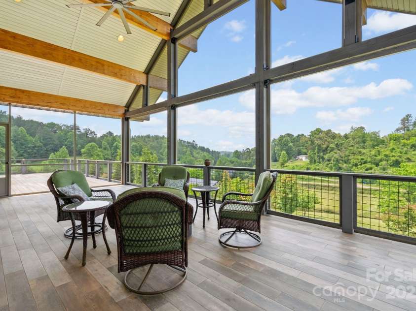 41 Bell Sprinkle Road, Weaverville, NC 28787.  MLS# CAR4268060, YatesRealty ID 24576. Lovely covered deck