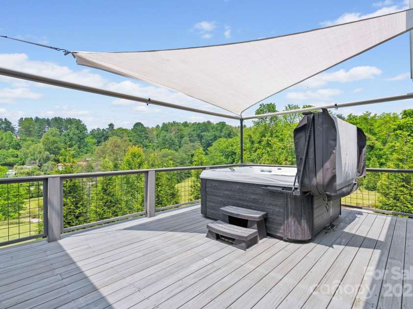 41 Bell Sprinkle Road, Weaverville, NC 28787.  MLS# CAR4268060, YatesRealty ID 24576. Shaded hot tub