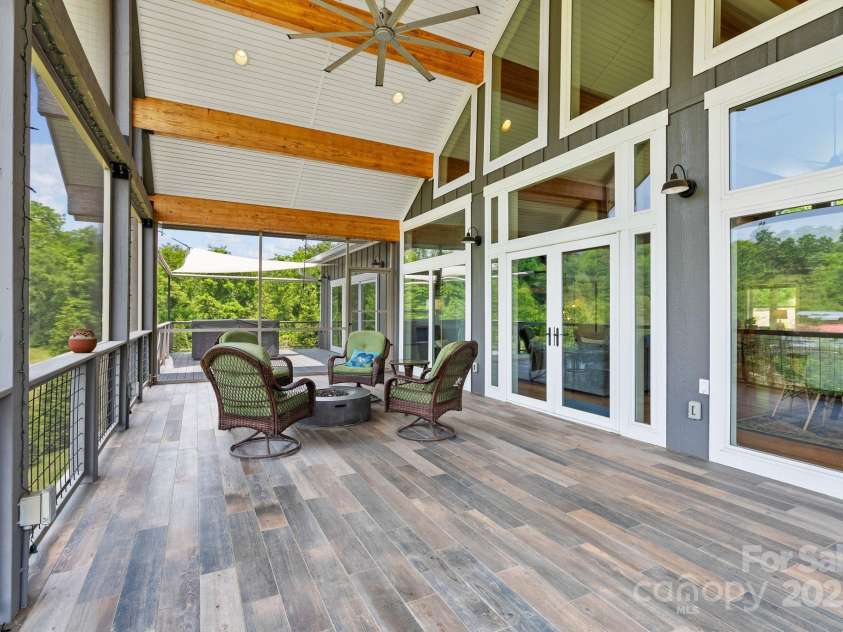 41 Bell Sprinkle Road, Weaverville, NC 28787.  MLS# CAR4268060, YatesRealty ID 24576. Vaulted outdoor space with beautiful tile