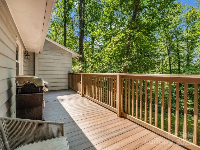 1463 Carolina Drive, Tryon, NC 28782.  MLS# CAR4275838, YatesRealty ID 24578. Back deck has mountain views