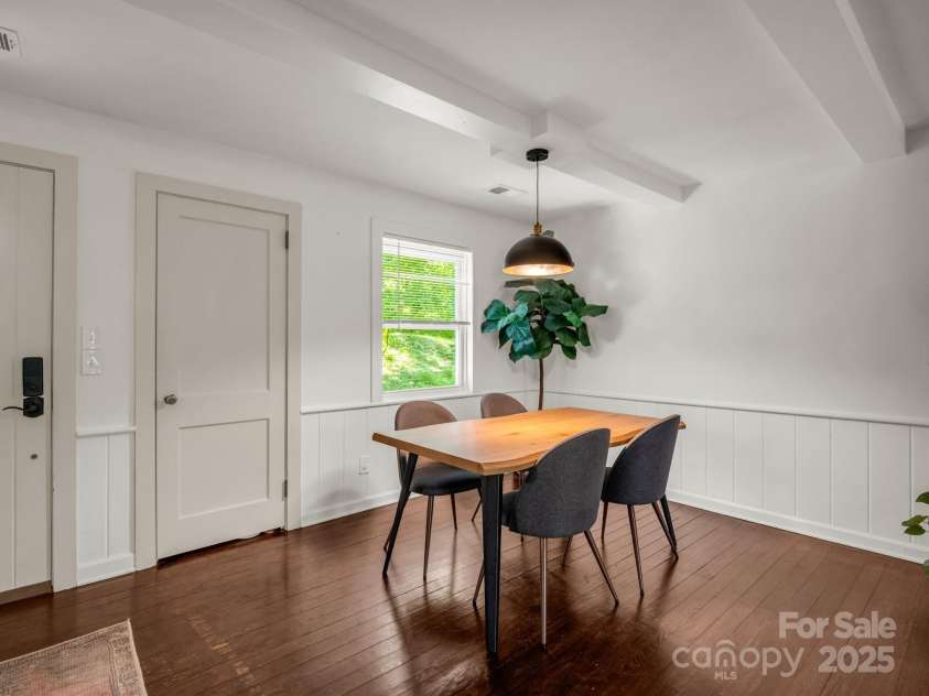 1463 Carolina Drive, Tryon, NC 28782.  MLS# CAR4275838, YatesRealty ID 24578. Dining area