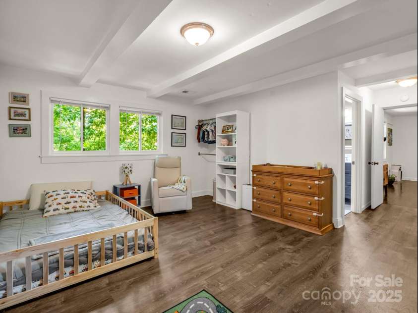 1463 Carolina Drive, Tryon, NC 28782.  MLS# CAR4275838, YatesRealty ID 24578. Guest bathroom is next to the guest bedroom