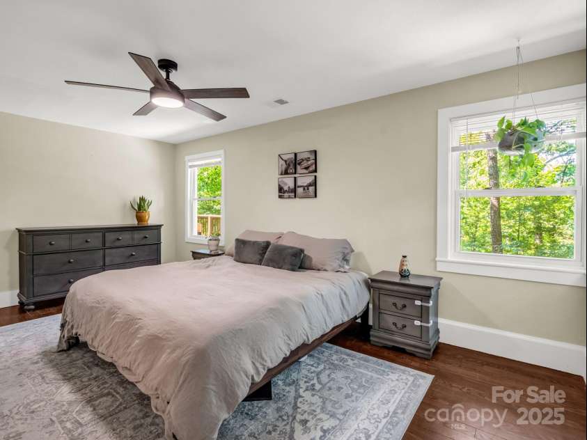 1463 Carolina Drive, Tryon, NC 28782.  MLS# CAR4275838, YatesRealty ID 24578. Primary bedroom faces the back of the house