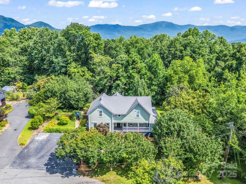 55 Lanier Street, Tryon, NC 28782.  MLS# CAR4276208, YatesRealty ID 24579. 