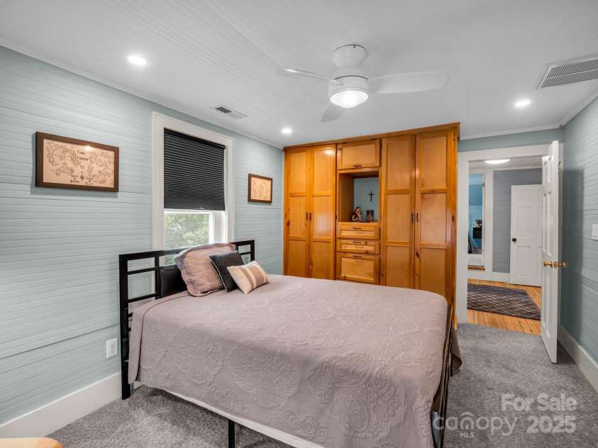 55 Lanier Street, Tryon, NC 28782.  MLS# CAR4276208, YatesRealty ID 24579. Bedroom #2 with custom built-ins