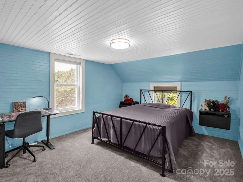 55 Lanier Street, Tryon, NC 28782.  MLS# CAR4276208, YatesRealty ID 24579. Bedroom #3 on the second floor has bead board ceiling and walls