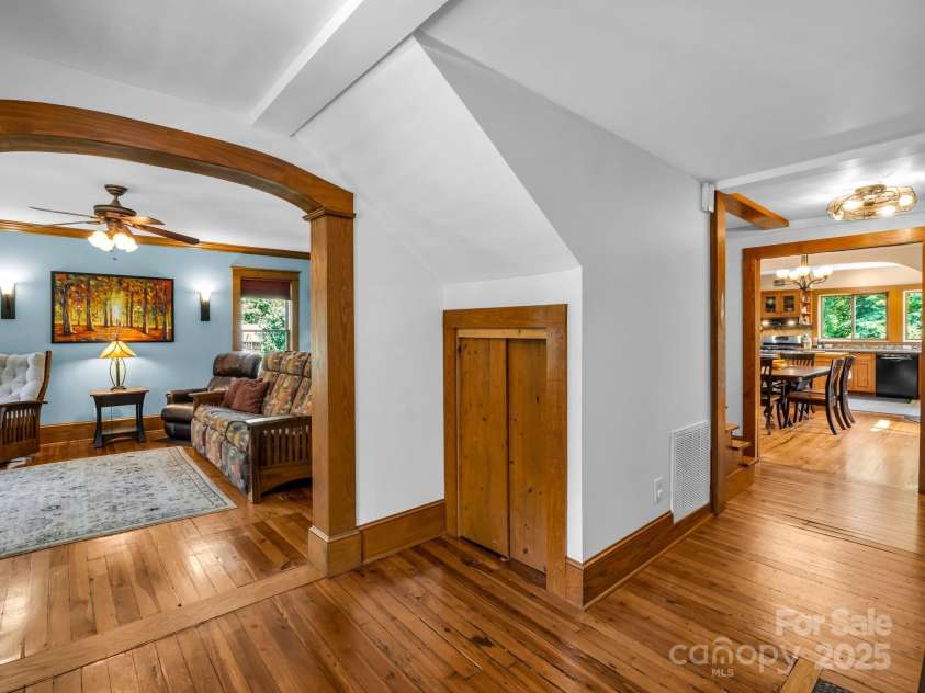 55 Lanier Street, Tryon, NC 28782.  MLS# CAR4276208, YatesRealty ID 24579. From the foyer the Living Room is on the left, Kitchen/Dining Area are straight ahead