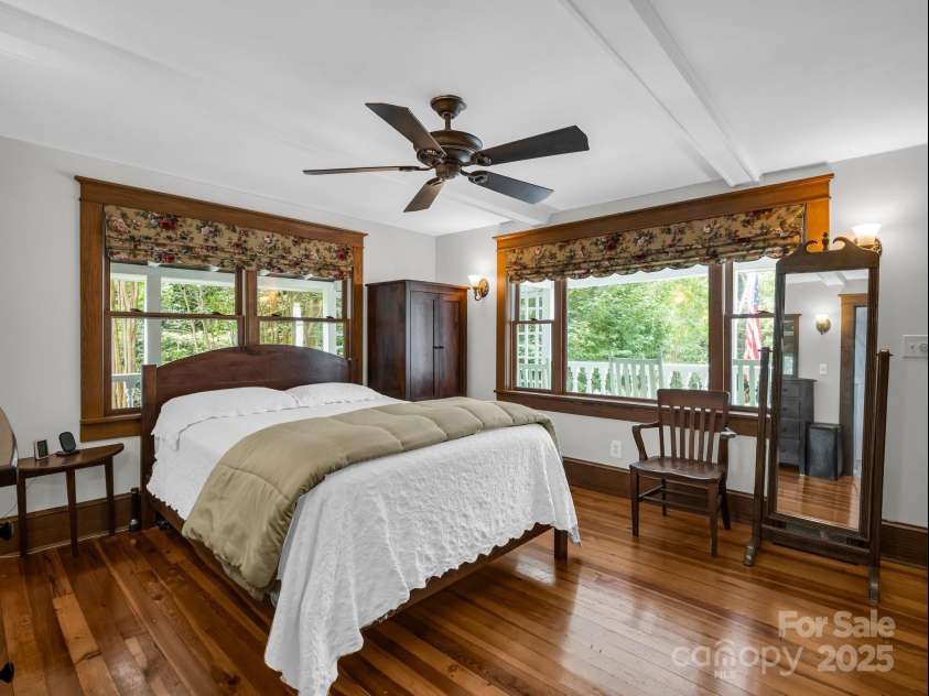 55 Lanier Street, Tryon, NC 28782.  MLS# CAR4276208, YatesRealty ID 24579. Primary bedroom