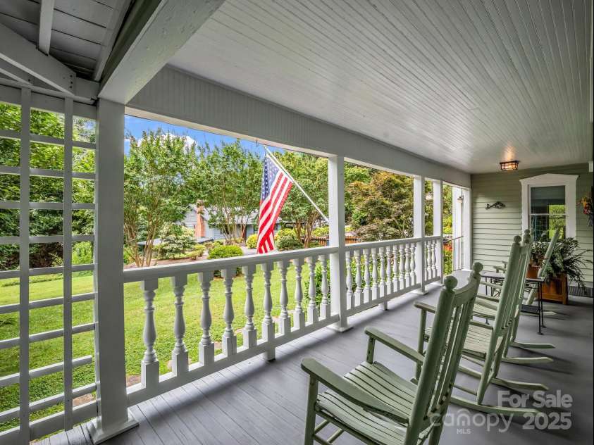 55 Lanier Street, Tryon, NC 28782.  MLS# CAR4276208, YatesRealty ID 24579. Private setting with in-town convenience