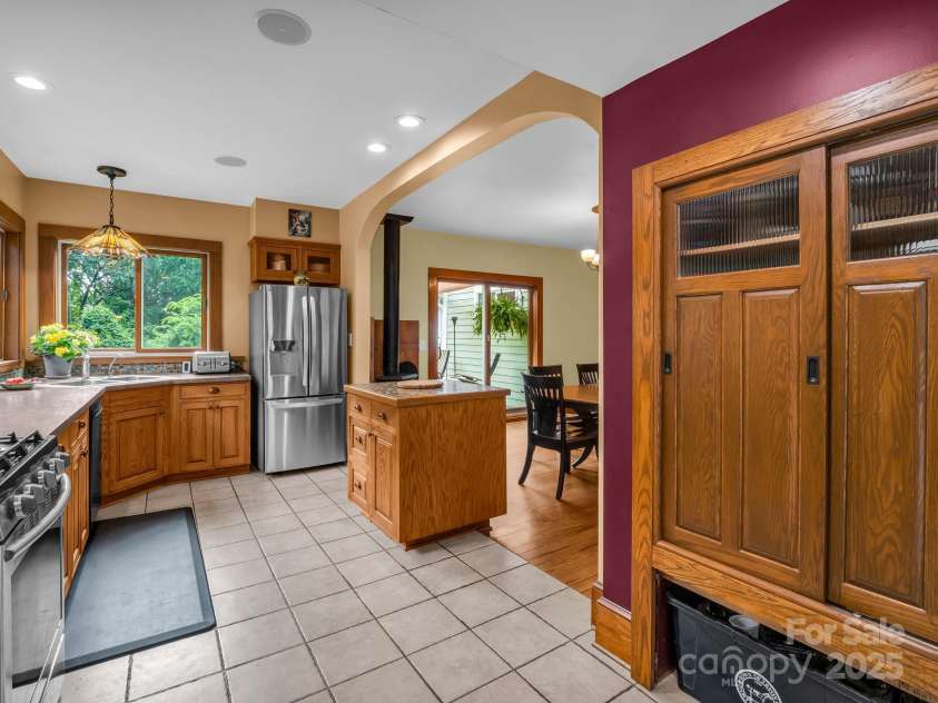 55 Lanier Street, Tryon, NC 28782.  MLS# CAR4276208, YatesRealty ID 24579. Tile floor in the kitchen