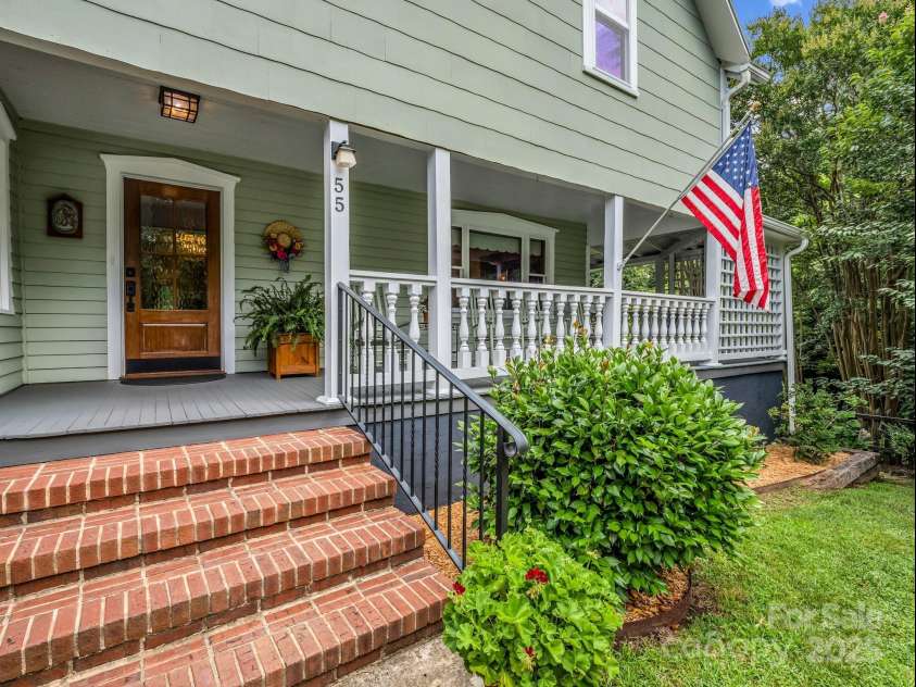 55 Lanier Street, Tryon, NC 28782.  MLS# CAR4276208, YatesRealty ID 24579. Wrap around front porch