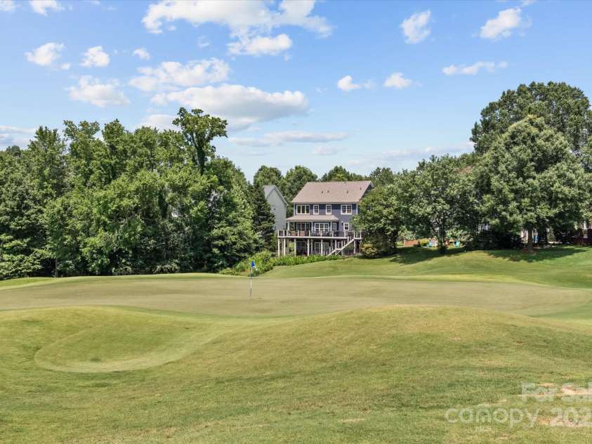 615 Oak Drive, Huntersville, NC 28078.  MLS# CAR4270830, YatesRealty ID 24585. Back of Property from Golf Course