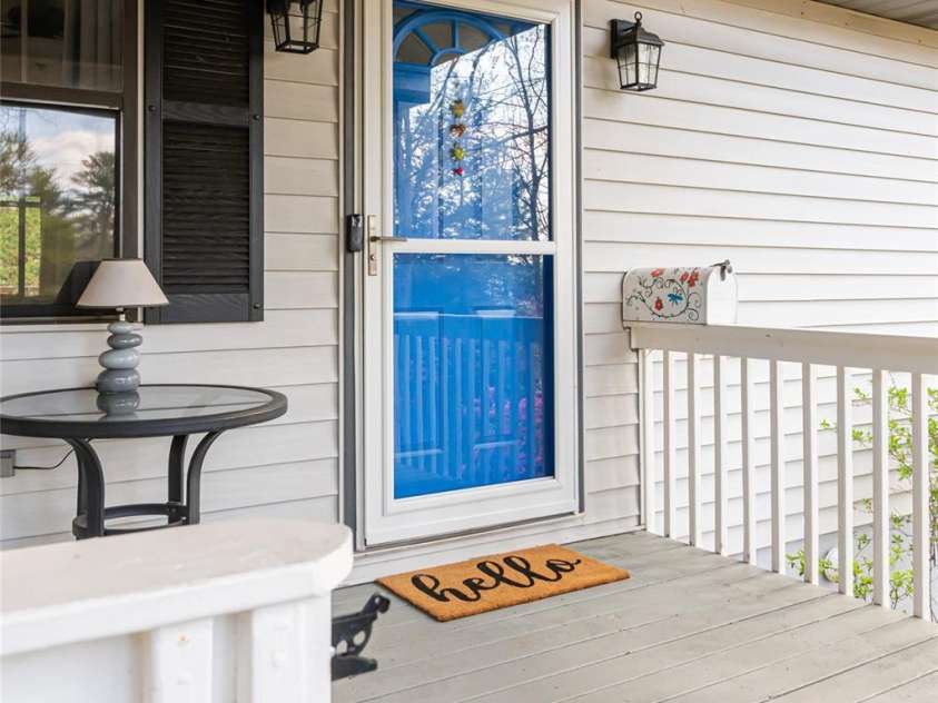 21 Mann Road, Asheville, NC 28805.  MLS# CAR4241057, YatesRealty ID 24588. Front Porch Entry