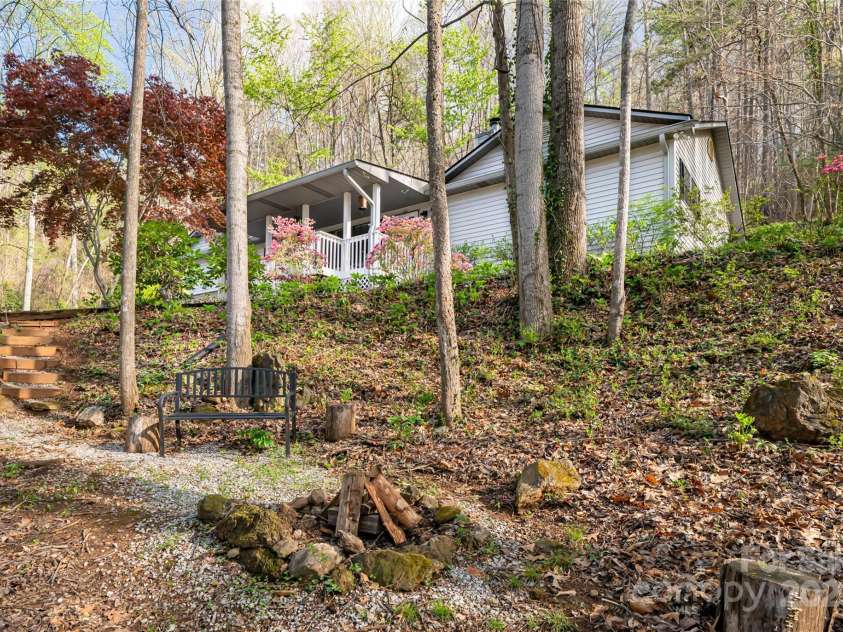 21 Mann Road, Asheville, NC 28805.  MLS# CAR4241057, YatesRealty ID 24588. Natural Front Parklike Yard