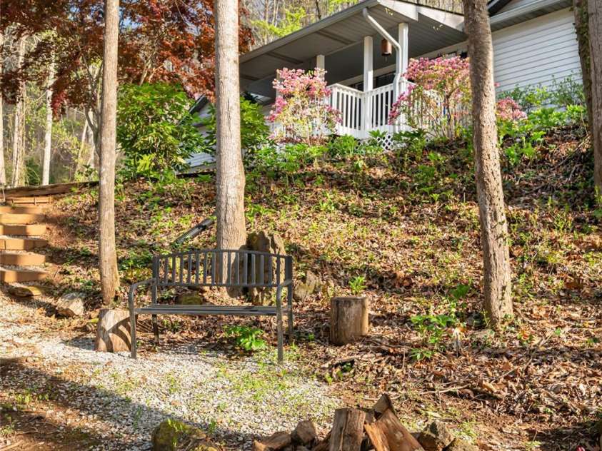 21 Mann Road, Asheville, NC 28805.  MLS# CAR4241057, YatesRealty ID 24588. Wooded Sitting Area
