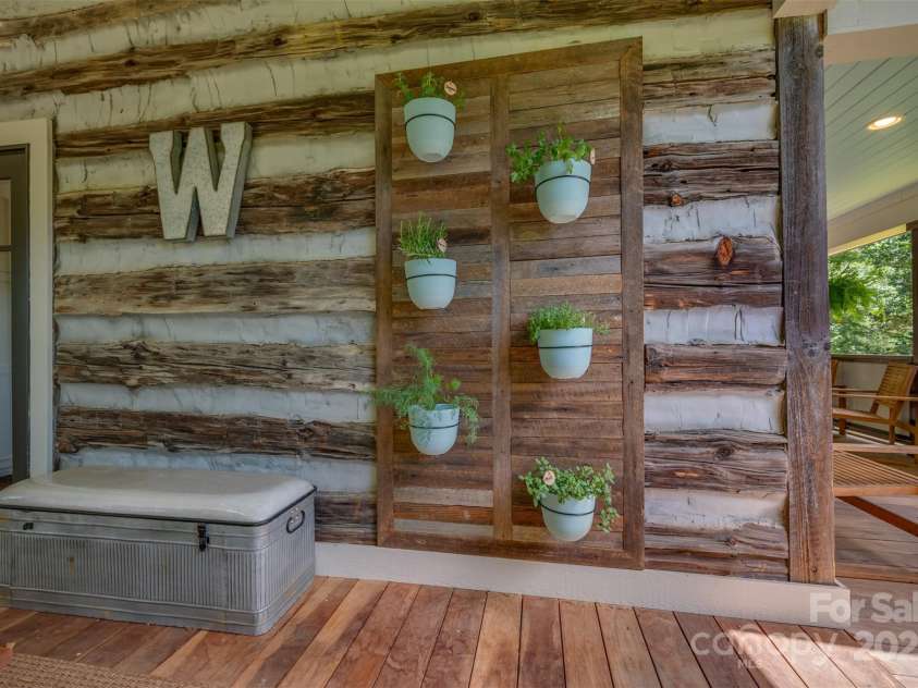 54 Holland Drive, Columbus, NC 28722.  MLS# CAR4309470, YatesRealty ID 2459. Wall herb garden