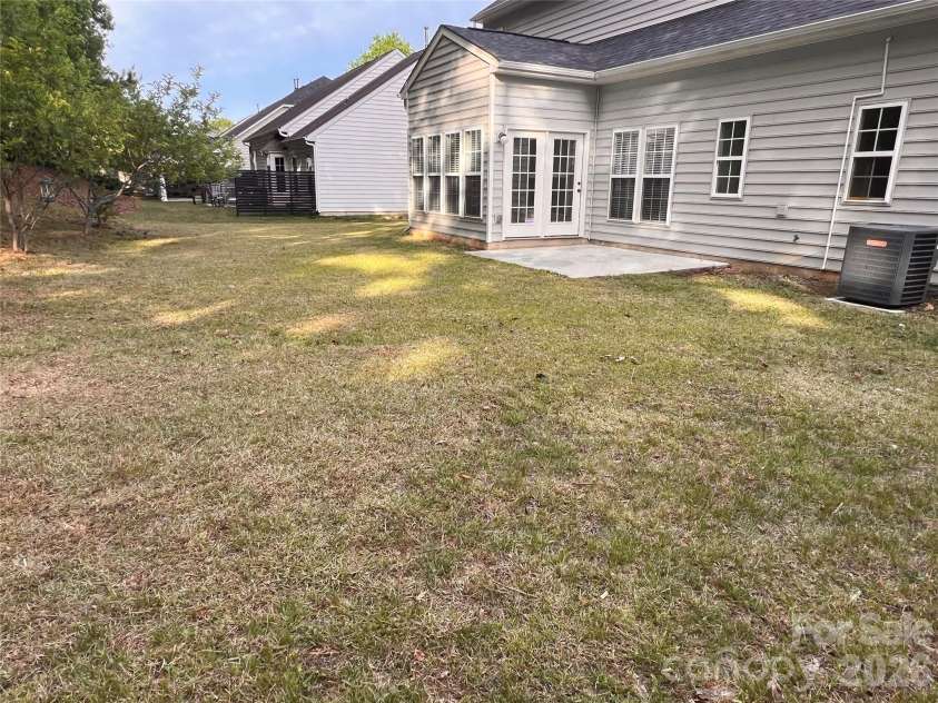 7709 Greylock Ridge Road, Matthews, NC 28105.  MLS# CAR4374056, YatesRealty ID 24593. Backyard
