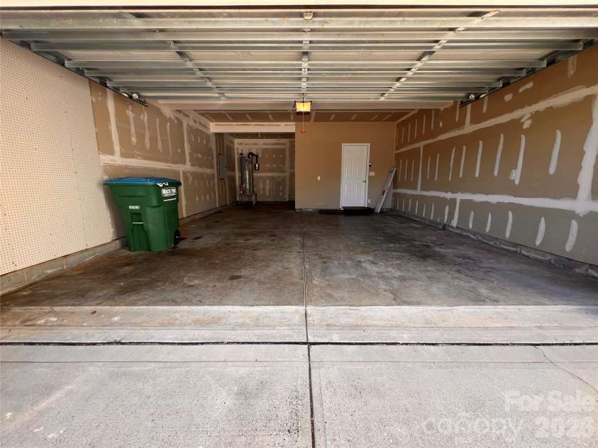 7709 Greylock Ridge Road, Matthews, NC 28105.  MLS# CAR4374056, YatesRealty ID 24593. Garage