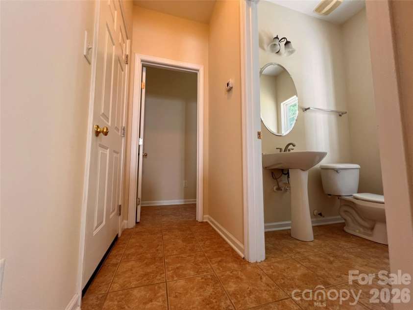 7709 Greylock Ridge Road, Matthews, NC 28105.  MLS# CAR4374056, YatesRealty ID 24593. Half Bathroom