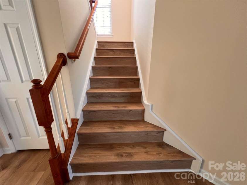 7709 Greylock Ridge Road, Matthews, NC 28105.  MLS# CAR4374056, YatesRealty ID 24593. Stairs (Toward 2nd floor)