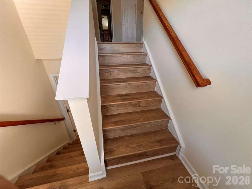7709 Greylock Ridge Road, Matthews, NC 28105.  MLS# CAR4374056, YatesRealty ID 24593. Stairs (Toward 3rd Floor)