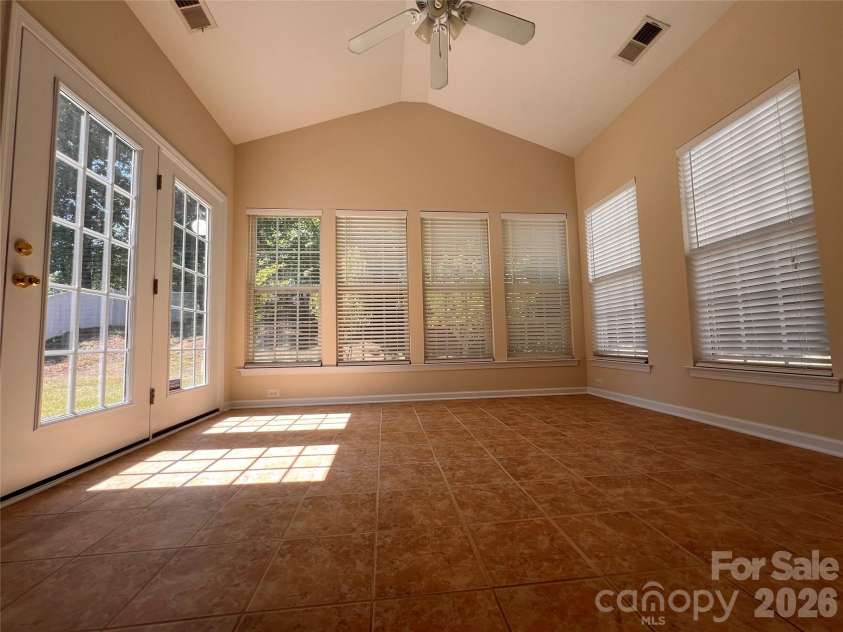 7709 Greylock Ridge Road, Matthews, NC 28105.  MLS# CAR4374056, YatesRealty ID 24593. Sunroom (Extra Dining Room)