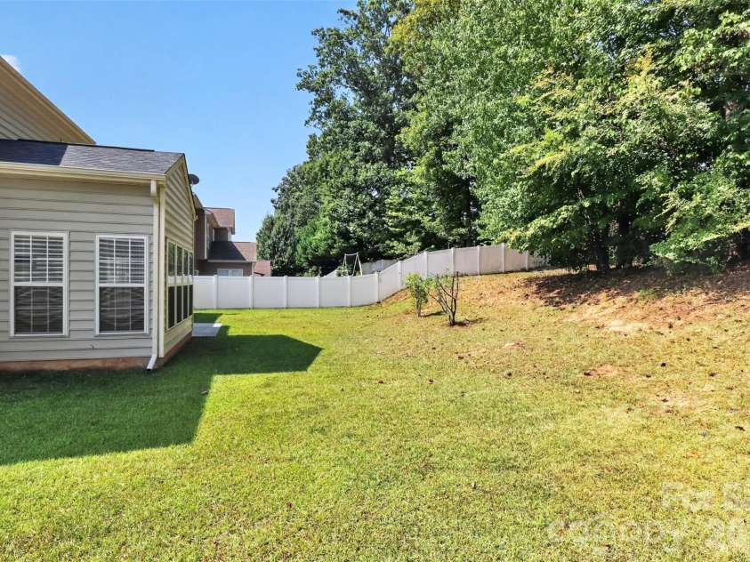 7709 Greylock Ridge Road, Matthews, NC 28105.  MLS# CAR4425798, YatesRealty ID 24593. Backyard