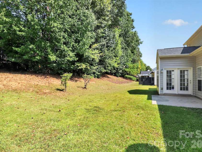 7709 Greylock Ridge Road, Matthews, NC 28105.  MLS# CAR4425798, YatesRealty ID 24593. Backyard