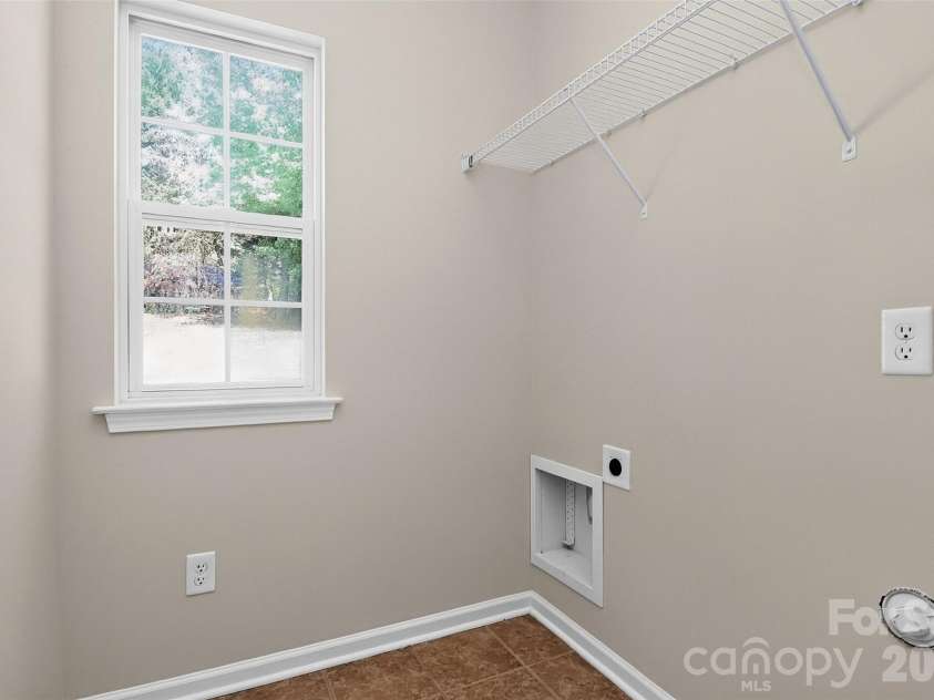 7709 Greylock Ridge Road, Matthews, NC 28105.  MLS# CAR4425798, YatesRealty ID 24593. Laundry
