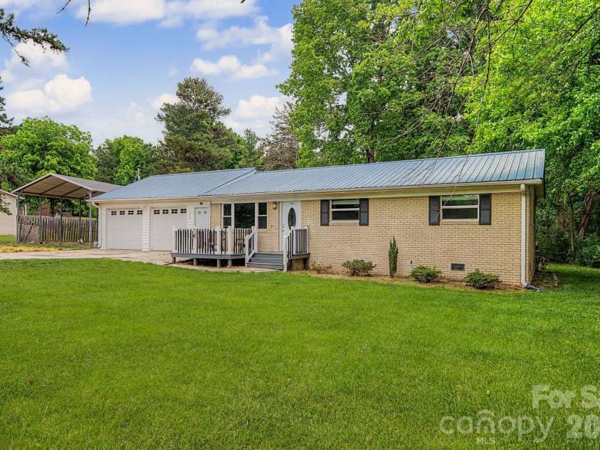 630 Ginger Cake Road, Lancaster, SC 29820.  MLS# CAR4378541, YatesRealty ID 24595. Front Exterior w/large yard