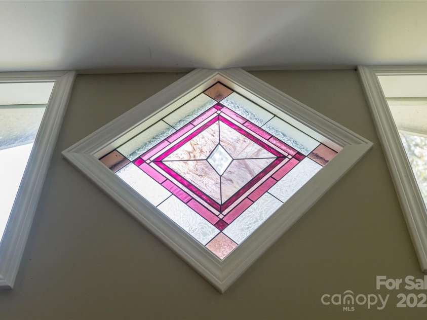 75 Cisco Road, Asheville, NC 28805.  MLS# CAR4269545, YatesRealty ID 24596. Dreamy Stained Glass