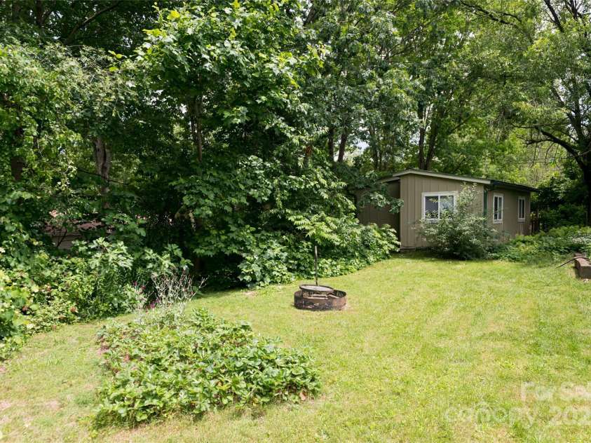 75 Cisco Road, Asheville, NC 28805.  MLS# CAR4269545, YatesRealty ID 24596. Spacious and Private Oasis 