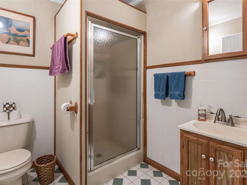 75 Cisco Road, Asheville, NC 28805.  MLS# CAR4269545, YatesRealty ID 24596. Third Full Bathroom 