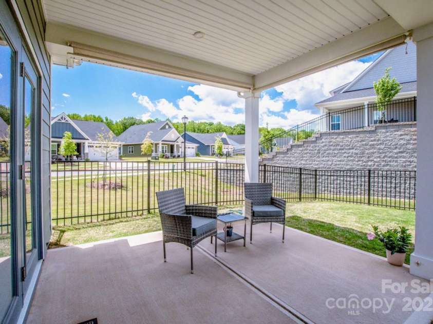 105 Chase View Lane, Troutman, NC 28166.  MLS# CAR4256483, YatesRealty ID 24599. Covered patio with sun shades on two sides