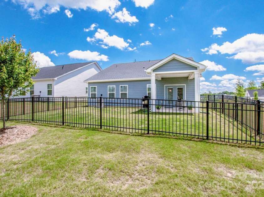 105 Chase View Lane, Troutman, NC 28166.  MLS# CAR4256483, YatesRealty ID 24599. Large fenced, flat backyard (lot extends beyond fence)