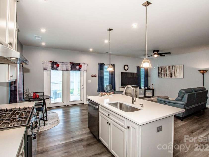 105 Chase View Lane, Troutman, NC 28166.  MLS# CAR4256483, YatesRealty ID 24599. View of open plan from kitchen
