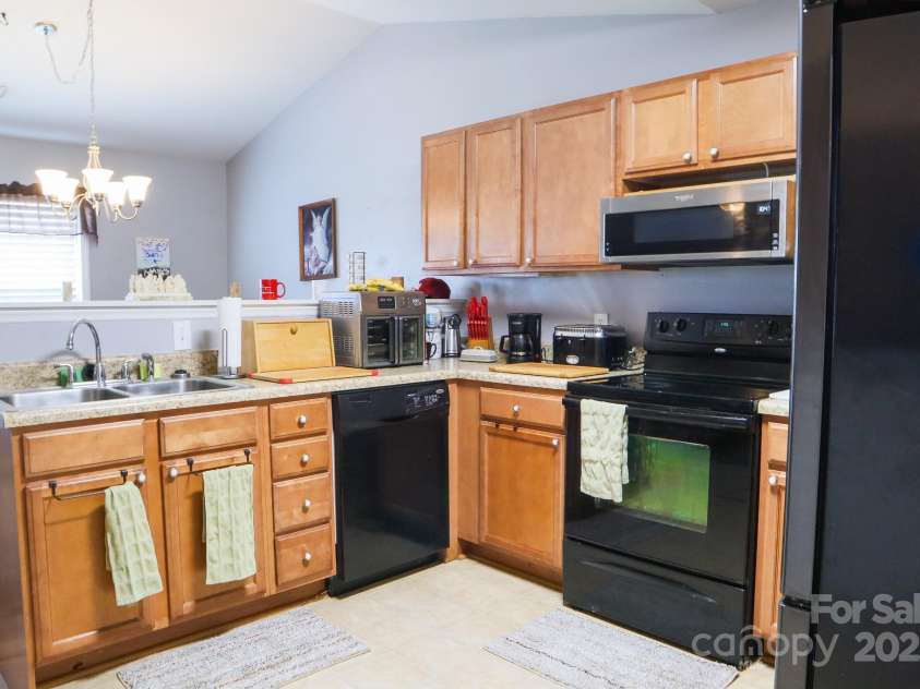 90 Elm Street, Morganton, NC 28655.  MLS# CAR4235791, YatesRealty ID 2460. Kitchen from Garage