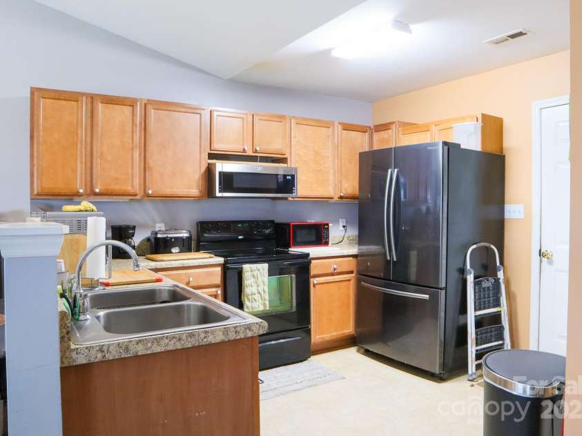 90 Elm Street, Morganton, NC 28655.  MLS# CAR4235791, YatesRealty ID 2460. Kitchen from Living Room