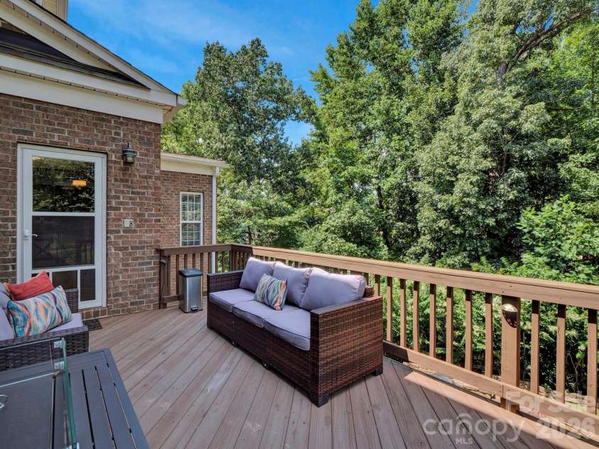 2652 Bedford Place, Concord, NC 28027.  MLS# CAR4368949, YatesRealty ID 24604. Deck off of kitchen