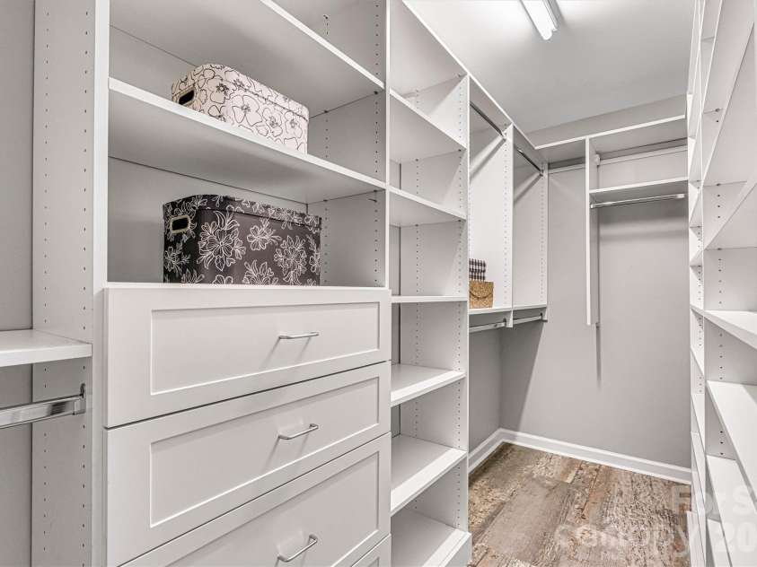 122 Kallie Loop, Mooresville, NC 28117.  MLS# CAR4367976, YatesRealty ID 24608. Primary bedroom custom closet. 