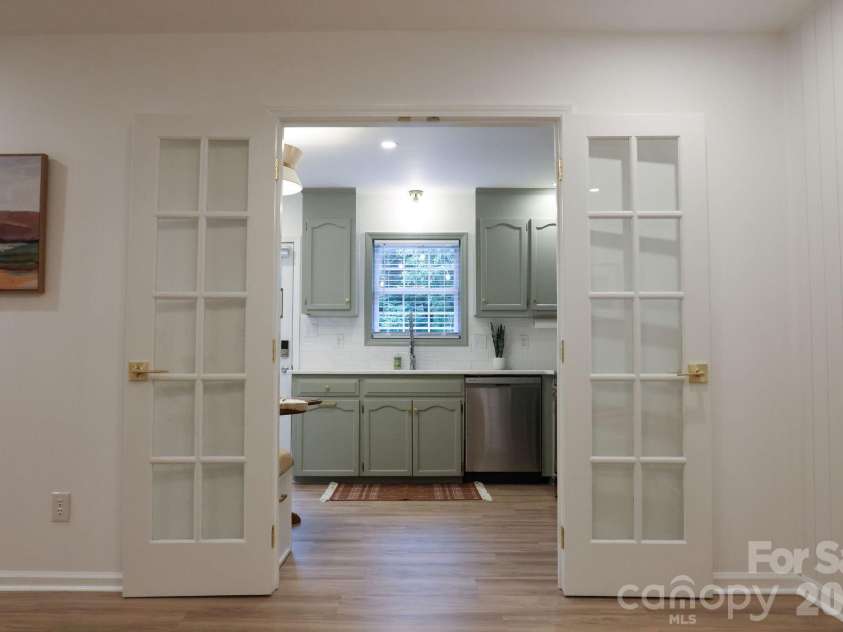 317 Devine Avenue, Belmont, NC 28012.  MLS# CAR4376938, YatesRealty ID 24610. French doors allow open flow to the kitchen or separation when needed