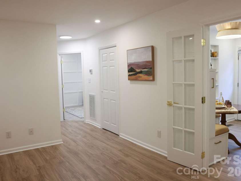 317 Devine Avenue, Belmont, NC 28012.  MLS# CAR4376938, YatesRealty ID 24610. Hallway to laundry and bedrooms
