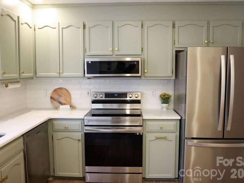 317 Devine Avenue, Belmont, NC 28012.  MLS# CAR4376938, YatesRealty ID 24610. Matching stainless smart range. Microwave has upgraded LED lights