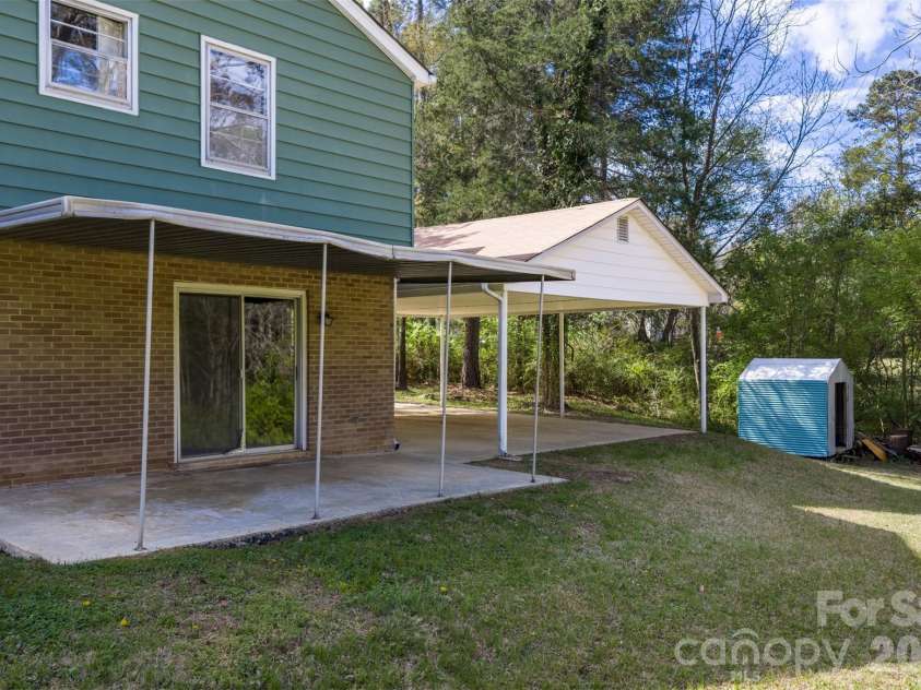 347 Red Fox Trail, Rock Hill, SC 29730.  MLS# CAR4363660, YatesRealty ID 24618. Covered Patio off lower level den.