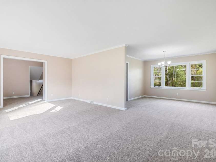347 Red Fox Trail, Rock Hill, SC 29730.  MLS# CAR4363660, YatesRealty ID 24618. Living Room looking into dining area.