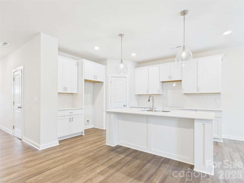 311 King Street, Kings Mountain, NC 28086.  MLS# CAR4349122, YatesRealty ID 2462. Island with breakfast bar for seating. Whirlpool stainless appliances are being installed.