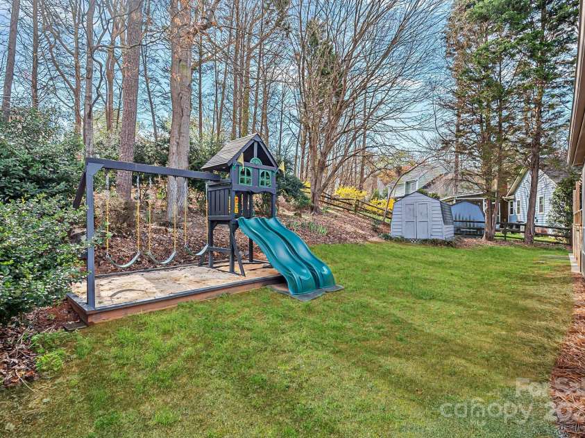 9027 Twin Trail Drive, Huntersville, NC 28078.  MLS# CAR4198608, YatesRealty ID 2462. Playground and Storage Shed